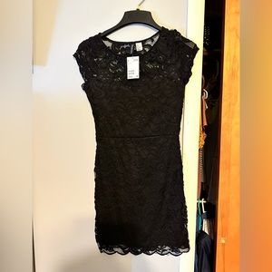 Black mini H&M dress. Brand new with tag. Never worn before.